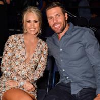 NASHVILLE, TENNESSEE - JUNE 05: Carrie Underwood and Mike Fisher attend the 2019 CMT Music Awards at Bridgestone Arena on June 05, 2019 in Nashville, Tennessee. (Photo by Jeff Kravitz/FilmMagic for CMT )