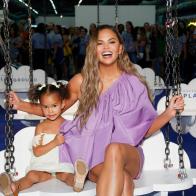 NEW YORK, NEW YORK - JUNE 23: Luna Legend and Chrissy Teigen pose for a photo during POPSUGAR Play/Ground at Pier 94 on June 23, 2019 in New York City. (Photo by Lars Niki/Getty Images for POPSUGAR and Reed Exhibitions )