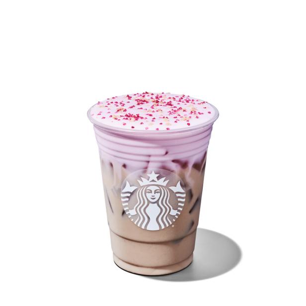 Inspired by our favorite spring blooms, an Iced Chai Latte is topped with a cherry-flavored cold foam with subtle floral and almond notes and a crunchy cherry-flavored topping for a springtime twist on a favorite.
