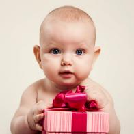 Beautiful baby with gift box