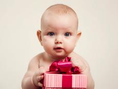 Beautiful baby with gift box