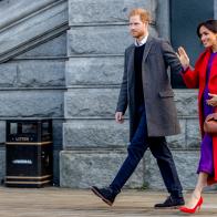 BIRKENHEAD, UNITED KINGDOM - JANUARY 14: Prince Harry, Duke of Sussex and Meghan, Duchess of Sussex visit a new statue to mark the 100th anniversary of the death of poet Wilfred Owen, which was erected on Hamilton Square in November, during an official visit to Birkenhead on January 14, 2019 in Birkenhead, United Kingdom. (Photo by Charlotte Graham - WPA Pool/Getty Images)