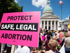 Thousands of demonstrators march in support of Planned Parenthood and pro-choice as they protest a state decision that would effectively halt abortions by revoking the license of the last center in the state that performs the procedure, during a rally in St. Louis, Missouri, May 30, 2019. (Photo by SAUL LOEB / AFP)        (Photo credit should read SAUL LOEB/AFP/Getty Images)