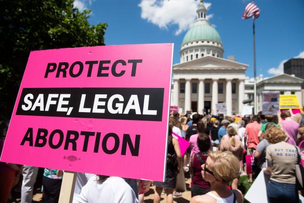 Thousands of demonstrators march in support of Planned Parenthood and pro-choice as they protest a state decision that would effectively halt abortions by revoking the license of the last center in the state that performs the procedure, during a rally in St. Louis, Missouri, May 30, 2019. (Photo by SAUL LOEB / AFP)        (Photo credit should read SAUL LOEB/AFP/Getty Images)
