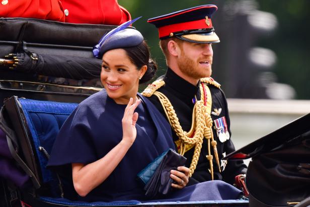 LONDON, ENGLAND - JUNE 08:  Meghan, Duchess of Sussex and Prince Harry, Duke of Sussex leave Buckingham Palace in a carriage during Trooping The Colour, the Queen's annual birthday parade, on June 8, 2019 in London, England.  (Photo by James Devaney/Getty Images)