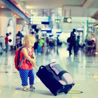 little girl with suitcase travel in the airport, kids travel