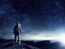 Astronaut in space suit. Elements of this image furnished by NASA