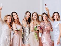 Six different cute women having fun, drinking champagne, celebrating a bachelorette party