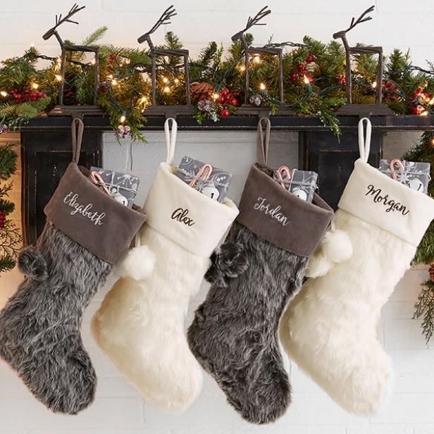 https://tlc.sndimg.com/content/dam/images/tlc/tlcme/fullset/2021/december/RX_xmas-stockings-fuzzy-personalized.jpg.rend.hgtvcom.616.616.suffix/1639671329160.jpeg