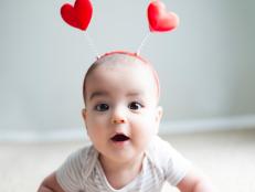 7 month old baby models hearts on his head