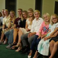 Entire family before their church performance