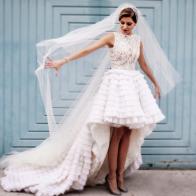 A bride holding out her veil