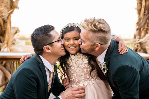 After saying their vows, Kenny and Armando pose with their daughter Hannah, as seen on 90 Day Fiancé: The Other Way.