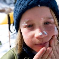 Ryan Zellers applies sunscreen, preparing for a day of skiing in the backcountry of California.