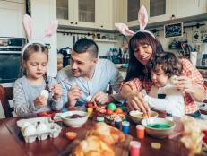 Lovely family prepare for Easter at domestic kitchen