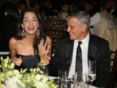 FLORENCE, ITALY - SEPTEMBER 06:  George Clooney (R) and fiance Amal Alamuddin attend the Celebrity Fight Night gala celebrating Celebrity Fight Night In Italy benefitting The Andrea Bocelli Foundation and The Muhammad Ali Parkinson Center on September 7, 2014 in Florence, Italy.  (Photo by Rachel Murray/Getty Images for Celebrity Fight Night)