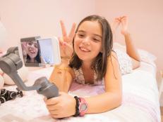 Generation Z girl recording vlog for social media on internet.