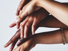 Cropped studio shot of a group of womenâ  s hands touching each other