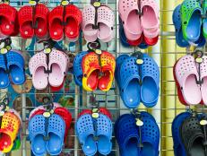 UNITED KINGDOM - JUNE 10:  Beach shoes on sale at general store selling seaside products in Aberdyfi, Aberdovey, Snowdonia, Wales  (Photo by Tim Graham/Getty Images)