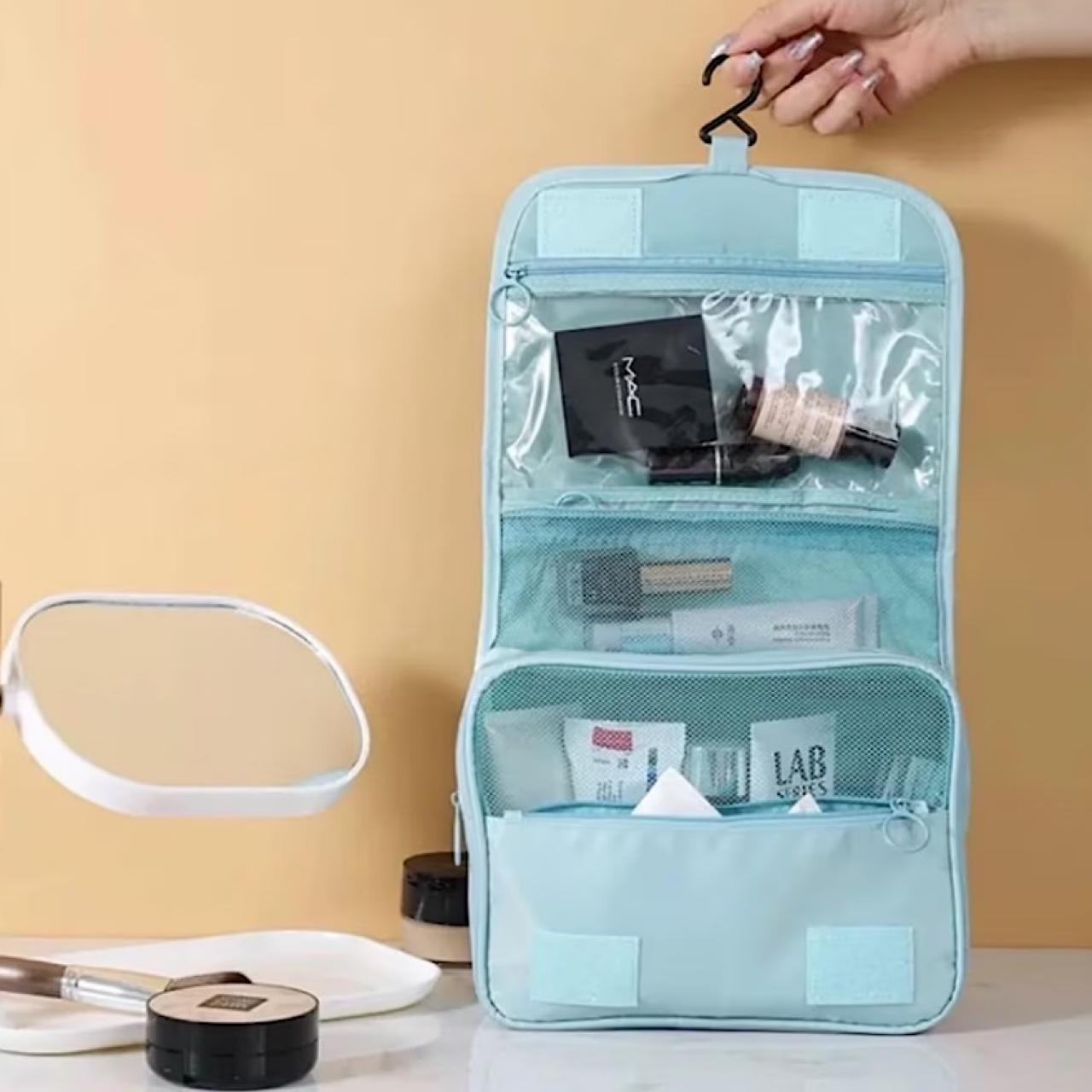 https://tlc.sndimg.com/content/dam/images/tlc/tlcme/fullset/2023/june/RX_hanging-toiletry-bag.jpg.rend.hgtvcom.1280.1280.suffix/1687978145531.jpeg