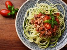 Zucchini noodles called zoodles with vegan bolognese and yeast flakes â   vegan, healthy food!